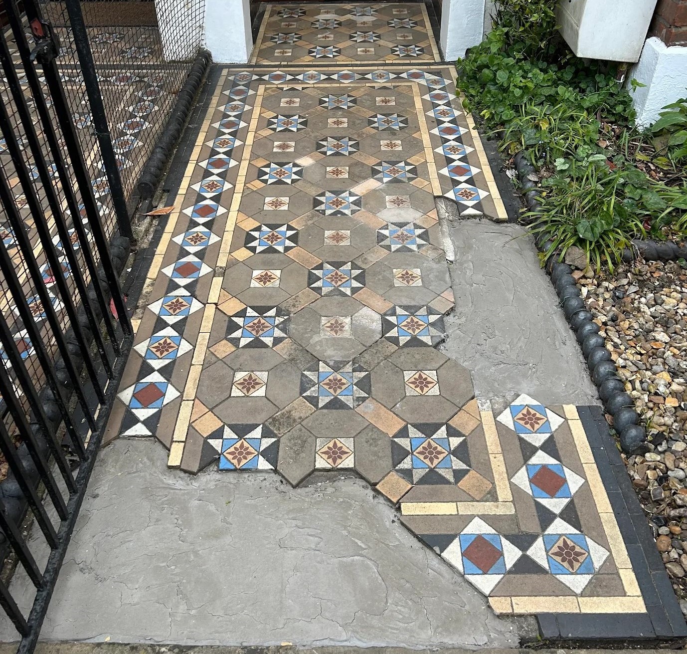 damaged victorian tiles before